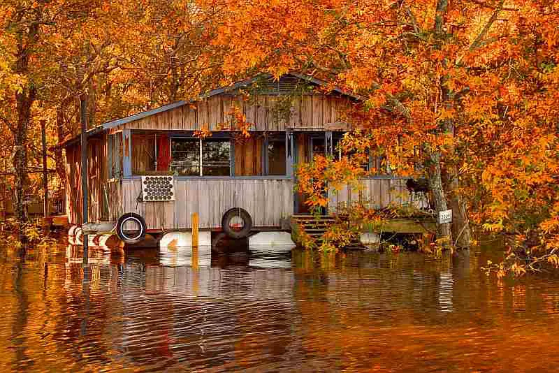 house-on-water-in-autumn